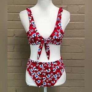 Dippin Daisy’s  NWOT. floral cutout swimsuit L